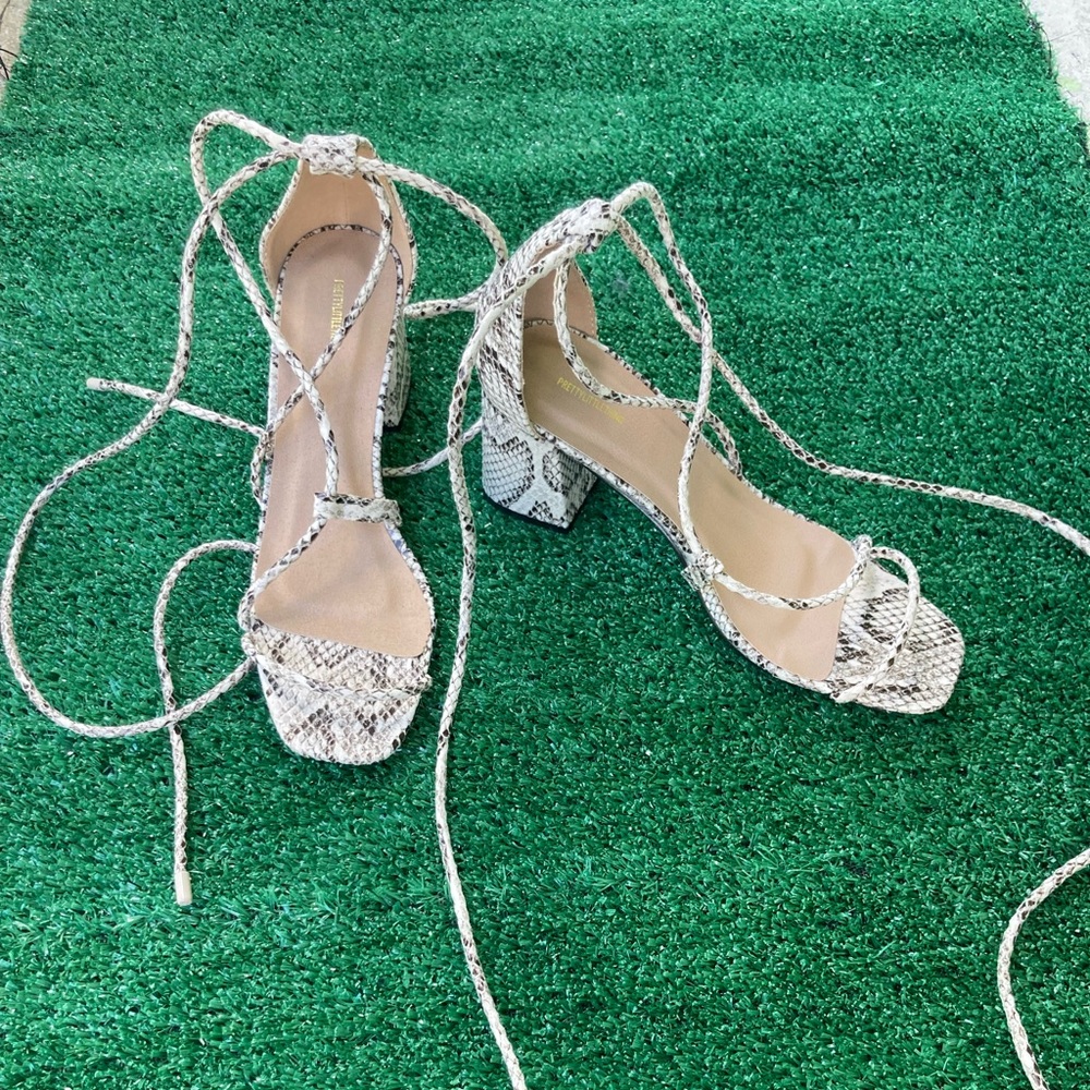 Snake laced up heels